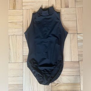 BalTogs black mock-neck leotard. Back zipper. Size M.
